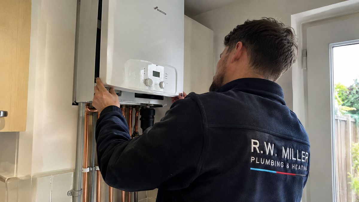 New combi boiler installed on a kitchen wall in a South London home