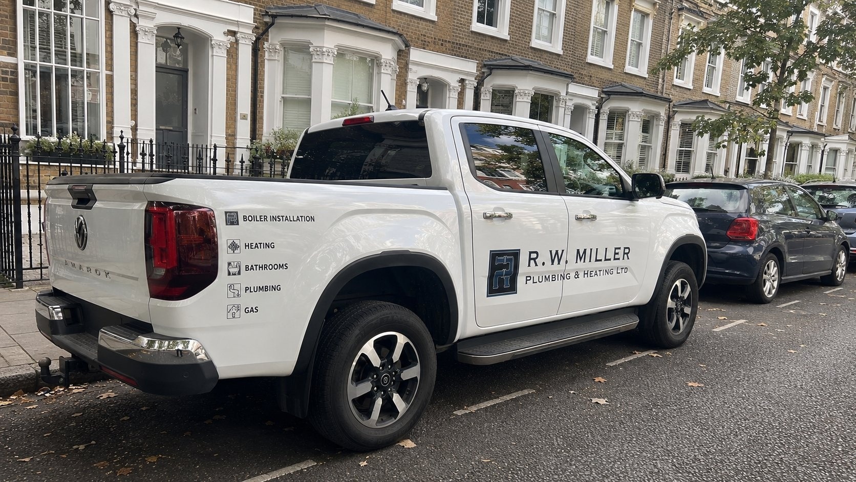 R.W. Miller Plumbing & Heating branded van parked on a South London street